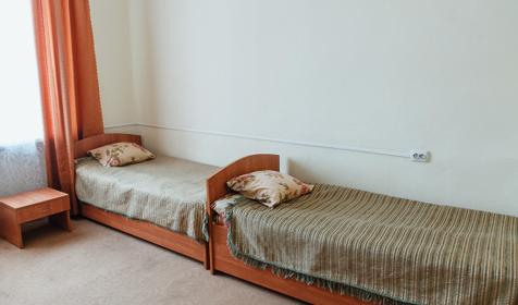 Кровать в общем трехместном номере